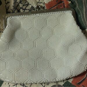 Elegant Vintage White Beaded Clutch. Has some missing beads. Made in Hong Kong.